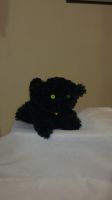 Petit chat noir (profil) tricot